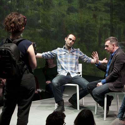 Khalid Abdalla and Paul Mason in Why It's Kicking Off Everywhere at the Young Vic. Photo by David Sandison.