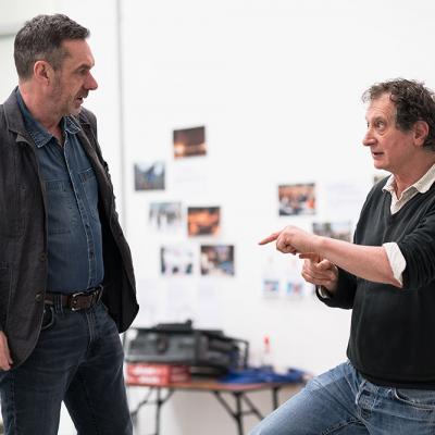 Paul Mason in rehearsal with director David Lan for Why It's Kicking Off Everywhere. Photo by Leon Puplett.