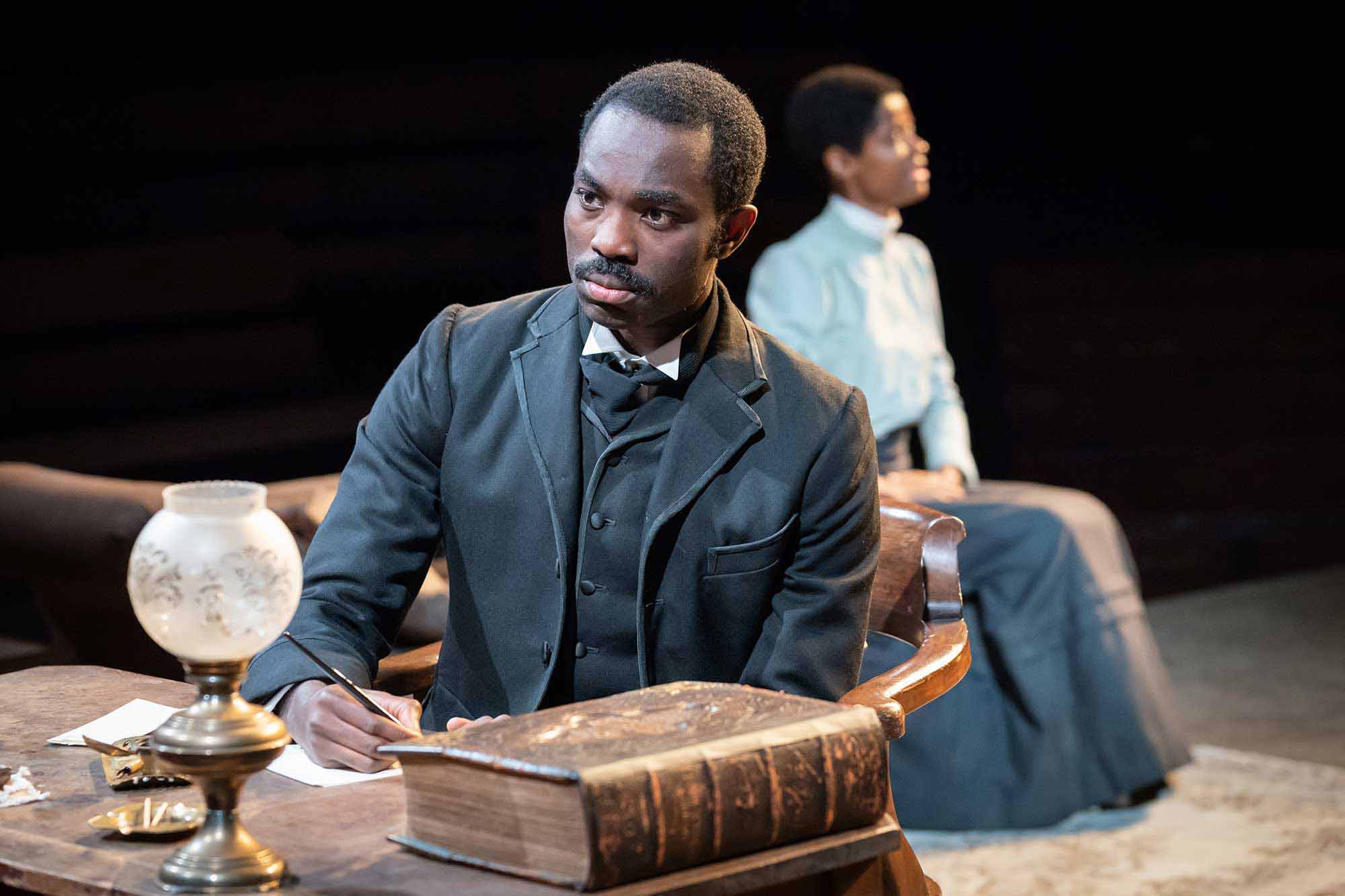 Paapa Essiedu and Letitia Wright in The Convert. Photography by Marc Brenner