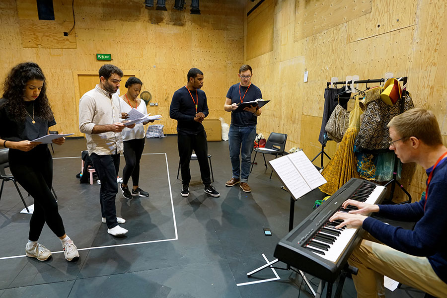 The cast of She Ventures and He Wins in rehearsal © Anthony Lee