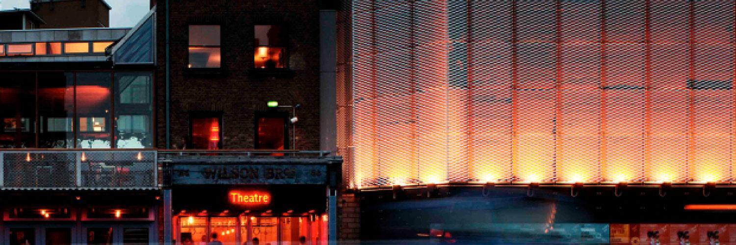 The outside of the Young Vic at night