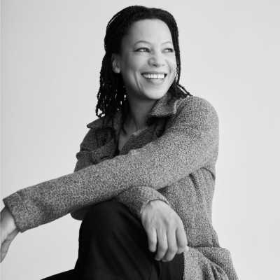 A headshot of Nina Sosanya