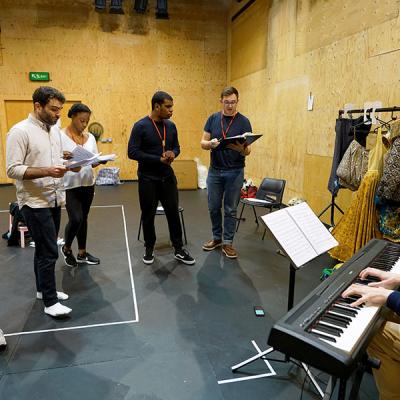 The cast of She Ventures and He Wins in rehearsal © Anthony Lee