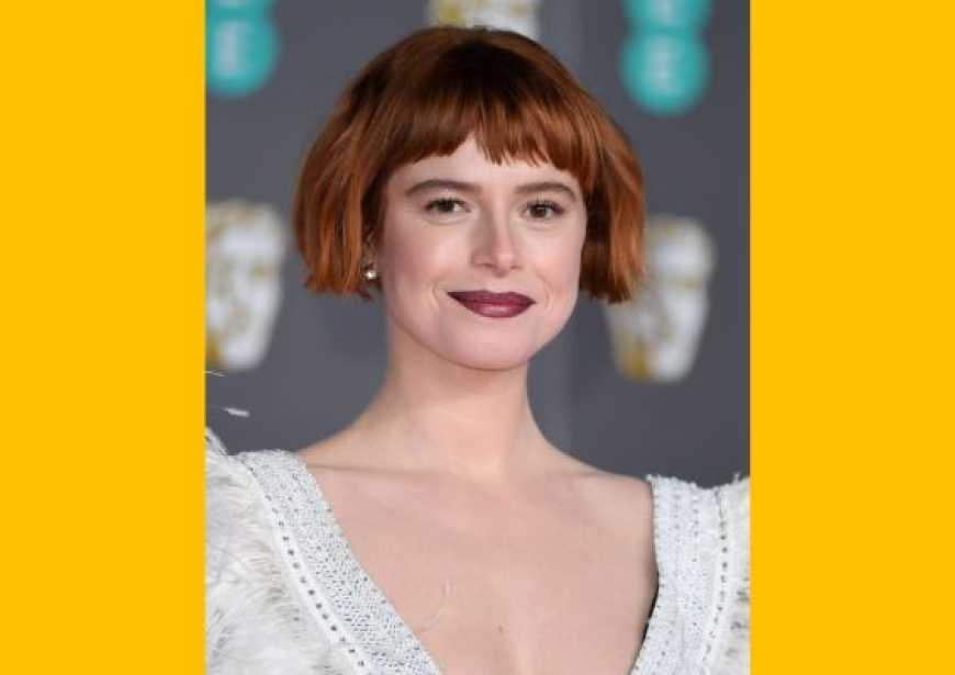 A headshot of Jessie Buckley