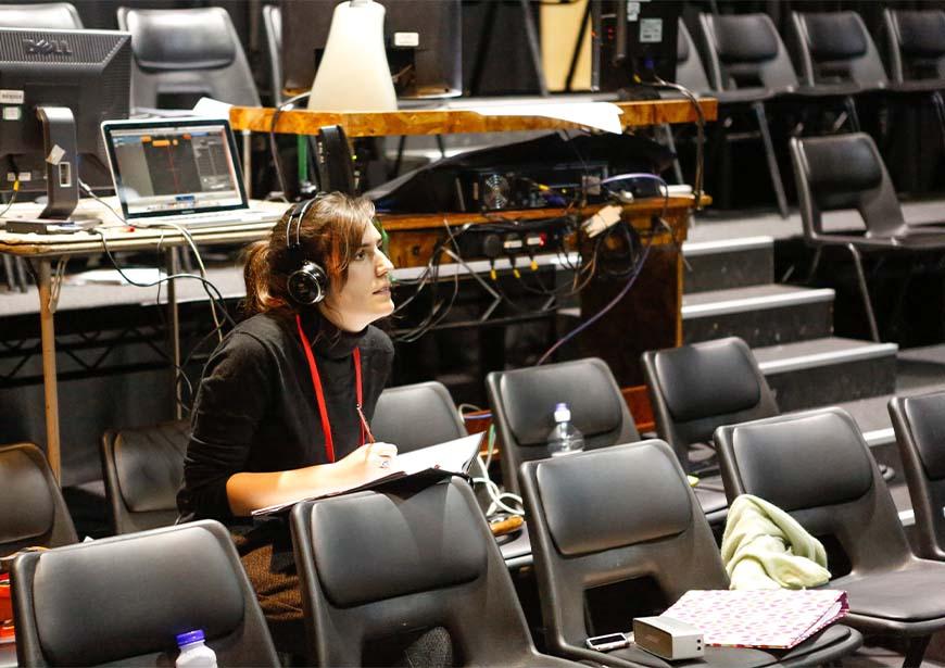 Image of a person at a desk