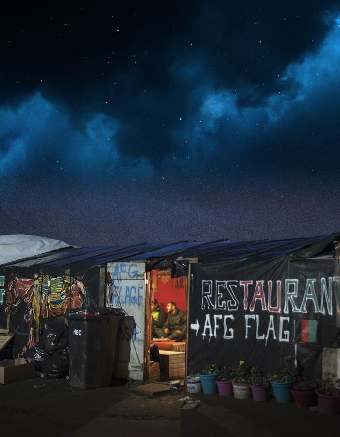 The Afghan cafe in 'The Jungle' below a starry night sky