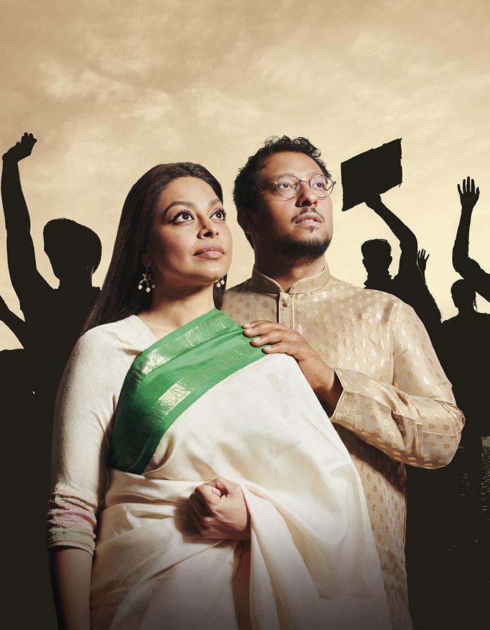 Chasing Hares. From 16th July to 13th August 2022. Image description: Irfan Shamji and Ayesha Dharker both standing with chins raised, looking into the distance. Behind them there are crowds of people with arms raised as if protesting, with the sky visible in the background.