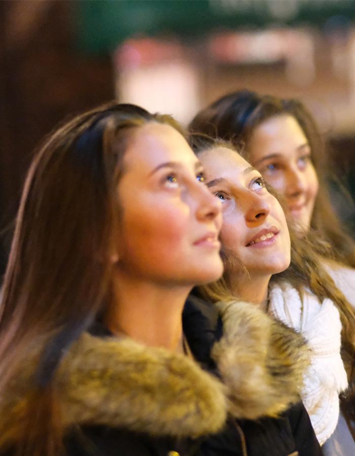 3 girls looking up into the distance