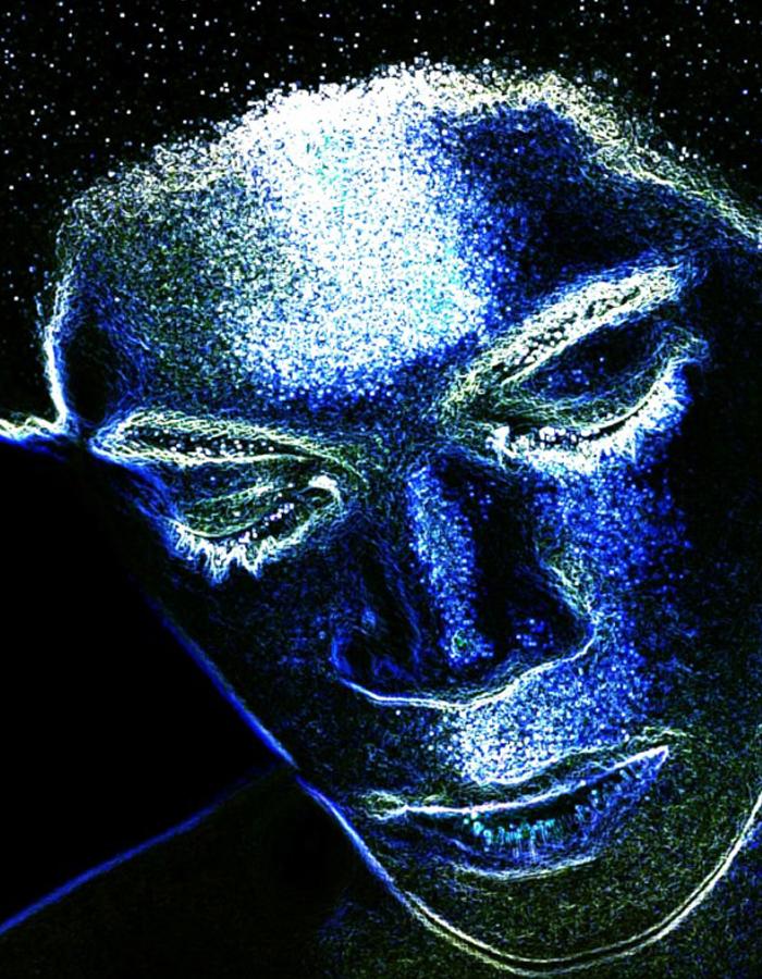 Silhouette of man in LED lights