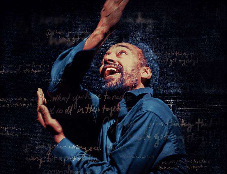 Black man, wearing a blue shirt, looking up and raising his arms to the sky. He’s surrounded by gold handwriting and a dark, textured background.