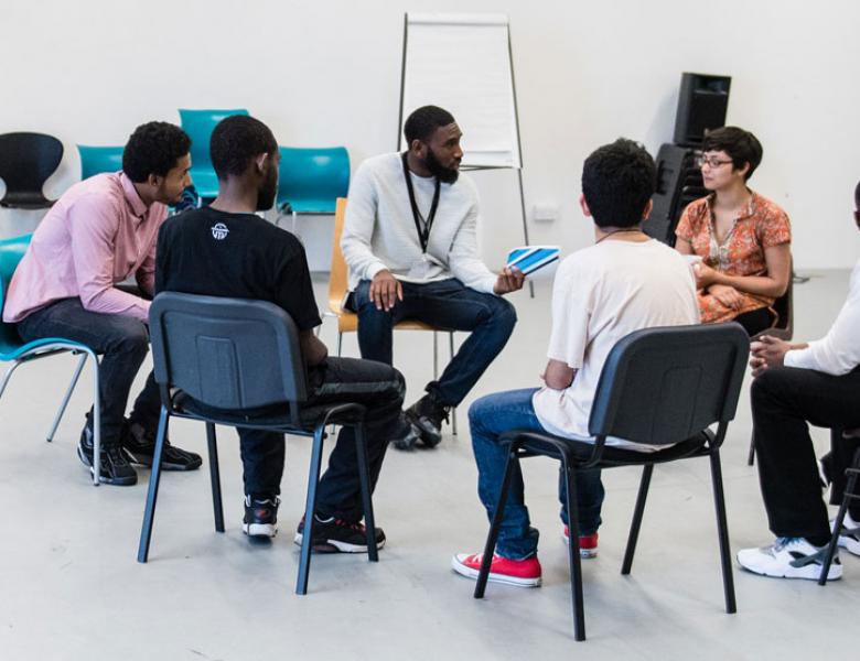 A group of Young Directors in an in-the-round discussion